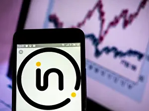 Finance And Economy Prints: Intertek Group plc company logo seen displayed on smart phone