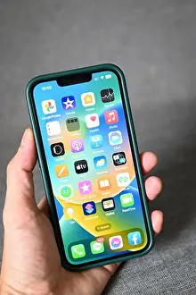 Update Prints: iPhone with iOS 16 logo on home screen