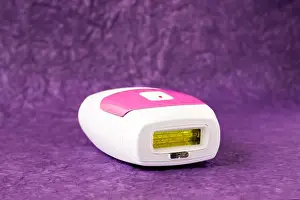 Shed Prints: IPL hair removal epilator on a purple background
