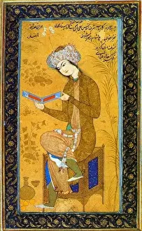 Iran: A youth reading. Watercolour painting by Riza Abbasi (c. 1565–1635), c. 1625-1626. Riza Abbasi, Riza yi-Abbasi or Reza-e Abbasi