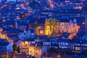 Walter Bibikow Prints: Ireland, County Cork, Cork City, elevated city view from St. Patrick's Hill, dusk