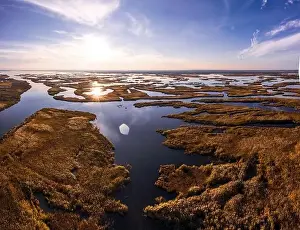 Dnepr Prints: Irresistible floods on the Samara River on the Dnieper in Ukraine in the evening warm bright light