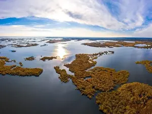 Dnepr Prints: Irresistible floods on the Samara River on the Dnieper in Ukraine in the evening warm bright light