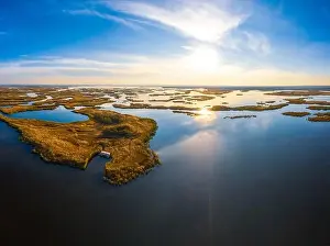 Dnepr Prints: Irresistible floods on the Samara River on the Dnieper in Ukraine in the evening warm bright light