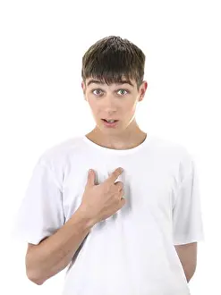 Against White Background Prints: Irresolute Young Man Pointing with a finger at Himself. Isolated On The White Background