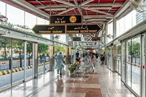 Underway Prints: Islamabad Rawalpindi Metro Bus Station Centaurus South at Blue Area View of People who are Sitting