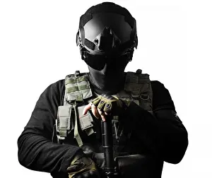 Vest Prints: Isolated closeup photo of a fully equipped swat soldier standing with rifle front view pose