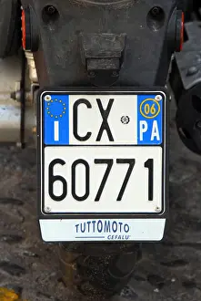 Occupied Prints: Italian licence plate on a Sicilian moped