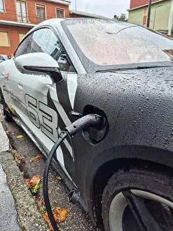Transports Prints: Italy, Milan, electric car charging batteries
