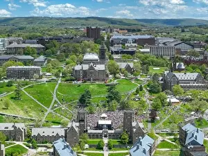 Ithaca, NY, USA - 05-08-2024: Distant aerial images of Slope Day at Cornell University Libe Slope, Ithaca, NY, USA