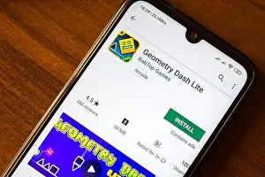 Android Prints: Ivanovsk, Russia - June 26, 2019: Geometry Dash Lite app on the display of smartphone or tablet