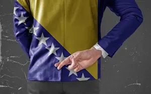 Crossed Prints: Jacket Flag of Bosnia and Herzegovina on Businessman with his fingers crossed behind his back