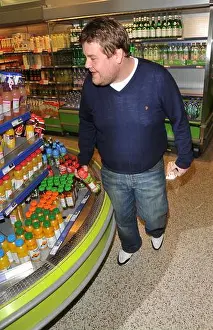 Leaving Prints: James Corden leaving the mayfair hotel london and going to sainsburys to get his lunch