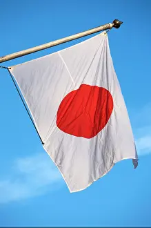 Ensigns Prints: A Japanese flag on a flag pole