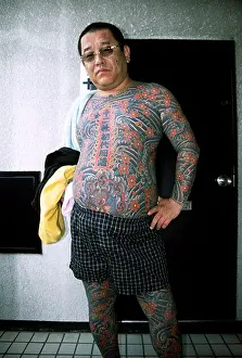 Gangster Prints: A Japanese man with a full body tattoo or Irezumi tattoo in Tokyo, Japan