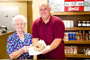 Made Prints: Jeff Benoit and grandma Corita display a ring of freshly made boudin