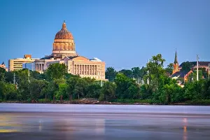 Statehouse Prints: Jefferson City, Missouri, USA downtown view on the Missouri River with the State Capitol at dusk