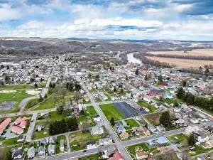 Jersey Shore, PA, USA - 03-17-2024 - Cloudy winter / spring aerial image of the borough