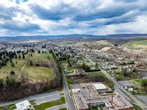 Jersey Shore, PA, USA - 03-17-2024 - Cloudy winter / spring aerial image of the borough