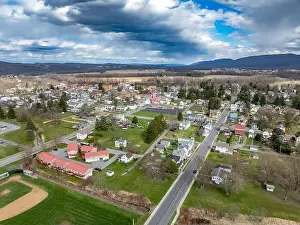 Jersey Shore, PA, USA - 03-17-2024 - Cloudy winter / spring aerial image of the borough