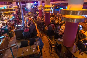 Waiter Prints: Jerusalem, israel. 'Mike's place' pub, a famous nighttime location