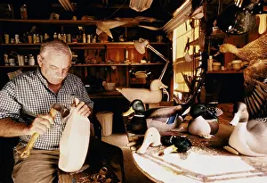 Carpenter Prints: jimmie vizier cajun ex poacher world champion decoy carver in workshop mississippi delta louisiana