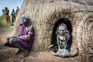 Body Painting Prints: JINKA, ETHIOPIA, - 19 AUGUST 2015:unidentified women from Mursi tribe with big lip Plate