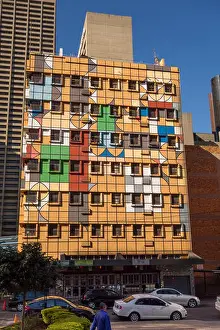 Inner City Prints: JOHANNESBURG, SOUTH AFRICA - Fanuel Motsepe's colorfully painted building