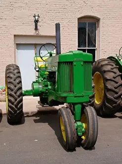 2008 Prints: John Deere Model 70 Tractor together with other classic tractors decked out for the 4th July Parade Williams AZ US