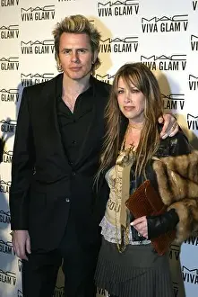 Wife Prints: John Taylor & wife Gela Nash-Taylor arriving at the MAC Viva Glam V Launch Dinner at the Hempel Hotel in London in 2004