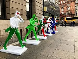 Teams Prints: Johnnie Walker Whisky striding man statues in Six Nations rugby colours