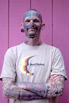 Gauge Prints: Josh Face, well known tattooed man of Ithaca, New York, USA