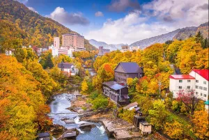 Hotels Prints: Jozankei, Japan inns and river skyline during the autumn season