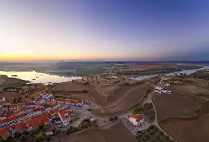 Juromenha castle, village and Guadiana river drone aerial view at sunset in Alentejo