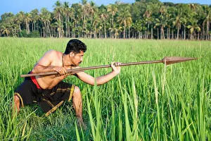 Fashioned Prints: Kalarippayat, warrior with spear in deep green rice paddy