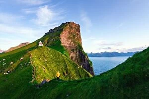 Images Dated 11th August 2019: Kallur lighthouse on green hills of Kalsoy island, Faroe islands, Denmark. Landscape photography