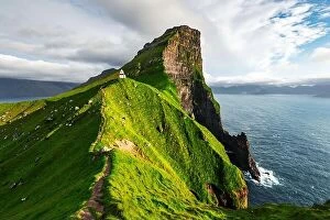 Images Dated 10th August 2019: Kallur lighthouse on green hills of Kalsoy island, Faroe islands, Denmark. Landscape photography