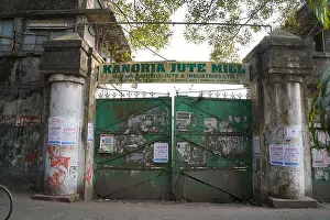 West Bengal Prints: Kanoria Jute Mill main gate. Seijberia, Uluberia, Howrah, West Bengal, India