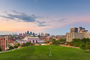 Kansas City, Missouri, USA downtown skyline with Union Station at dusk