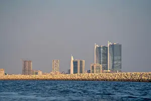 Karachi Prints: Karachi, Pakistan - 21 November 2024: View of the city skyline rising behind a rugged