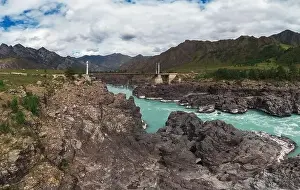 Altay Prints: The Katun river rapids in summer day at the Oroctoy bridge in Altai Republic