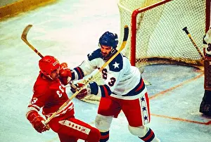 Team Prints: Ken Morrow of Team USA checks USSR player during the Men's Ice Hockey semi-final at the 1980 Olympic Winter Games