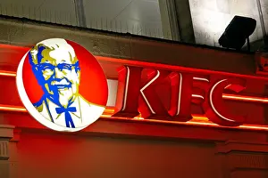 High Street Prints: KFC Kentucky Fried Chicken logo sign in neon at night London W1 England
