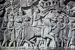 Khmer Prints: A Khmer army military commander riding his horse as as his army marches carrying spears