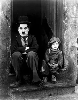 Charlie Prints: The Kid is a 1921 American silent comedy-drama film written
