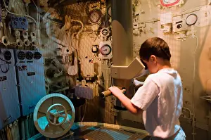 Chicago Illinois Prints: Kid looking through periscope at the U 505 submarine exhibit at the Museum of Science and Industry Chicago Illinois