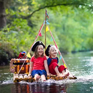 Pirate Ship Prints: Kids dressed in pirate costumes and hats with treasure chest