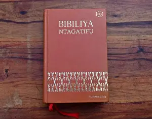 Rwanda Prints: Kinyarwanda language Catholic Holy Bible on wooden table