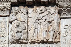 Kiss Prints: The Kiss of Judas, medieval relief on the facade of Basilica of San Zeno in Verona, Italy