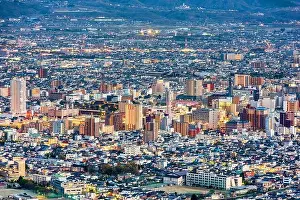 Landscape Prints: Kofu, Yamanashi, Japan downtown city skyline from the mountains at dusk